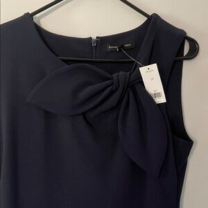 Elegant Navy Sleeveless Dress with bow.